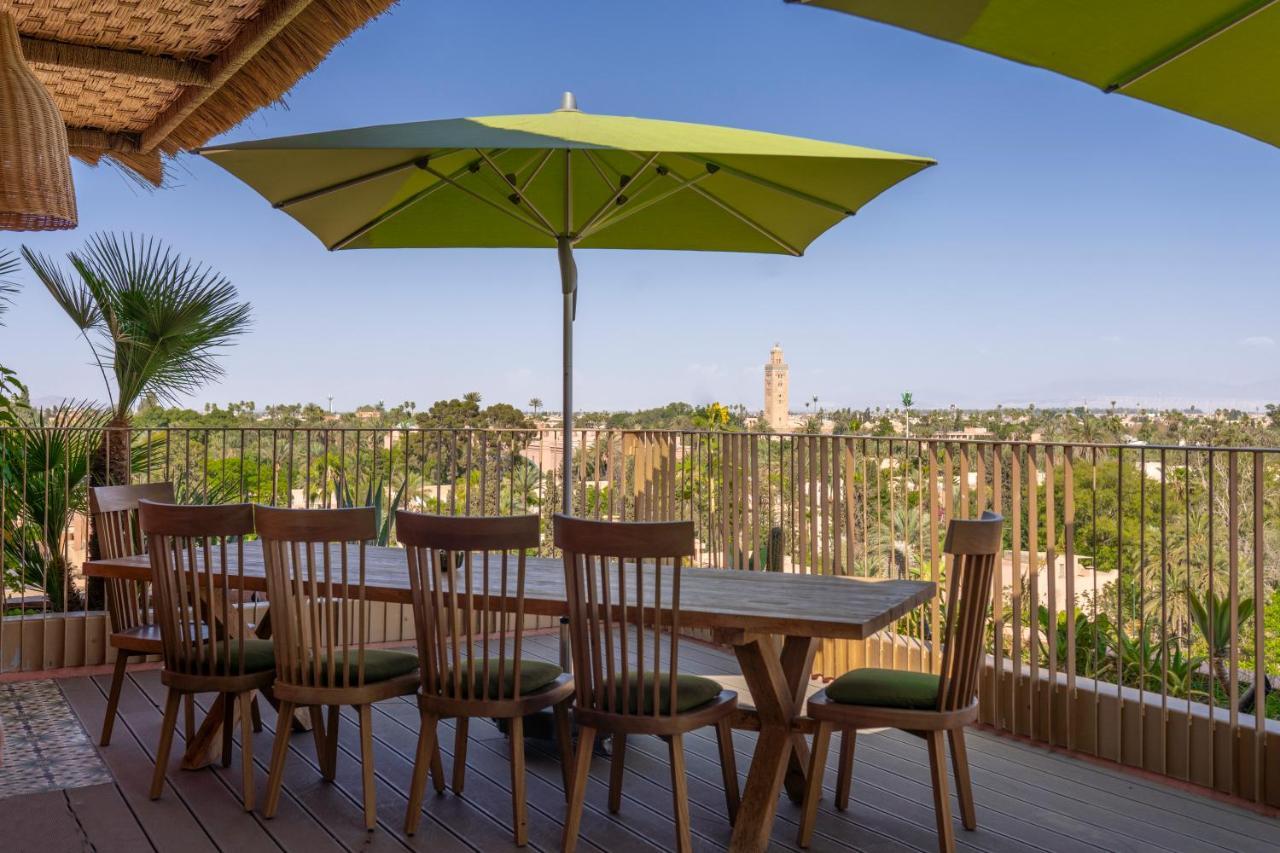 Hotel Jadali & Spa Marrakesh Exteriör bild A patio umbrella